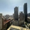 Urban cityscape with tall skyscrapers in downtown.