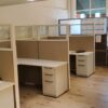 Office cubicles with desks and storage for productive work environments.