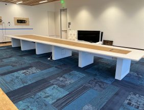 Modern office space with pre-owned cubicles and furniture for sale.
