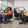 Diverse team using ergonomic, accessible office furniture for inclusive work environments.