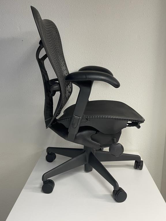 Herman Miller Mirra black seat graphite frame