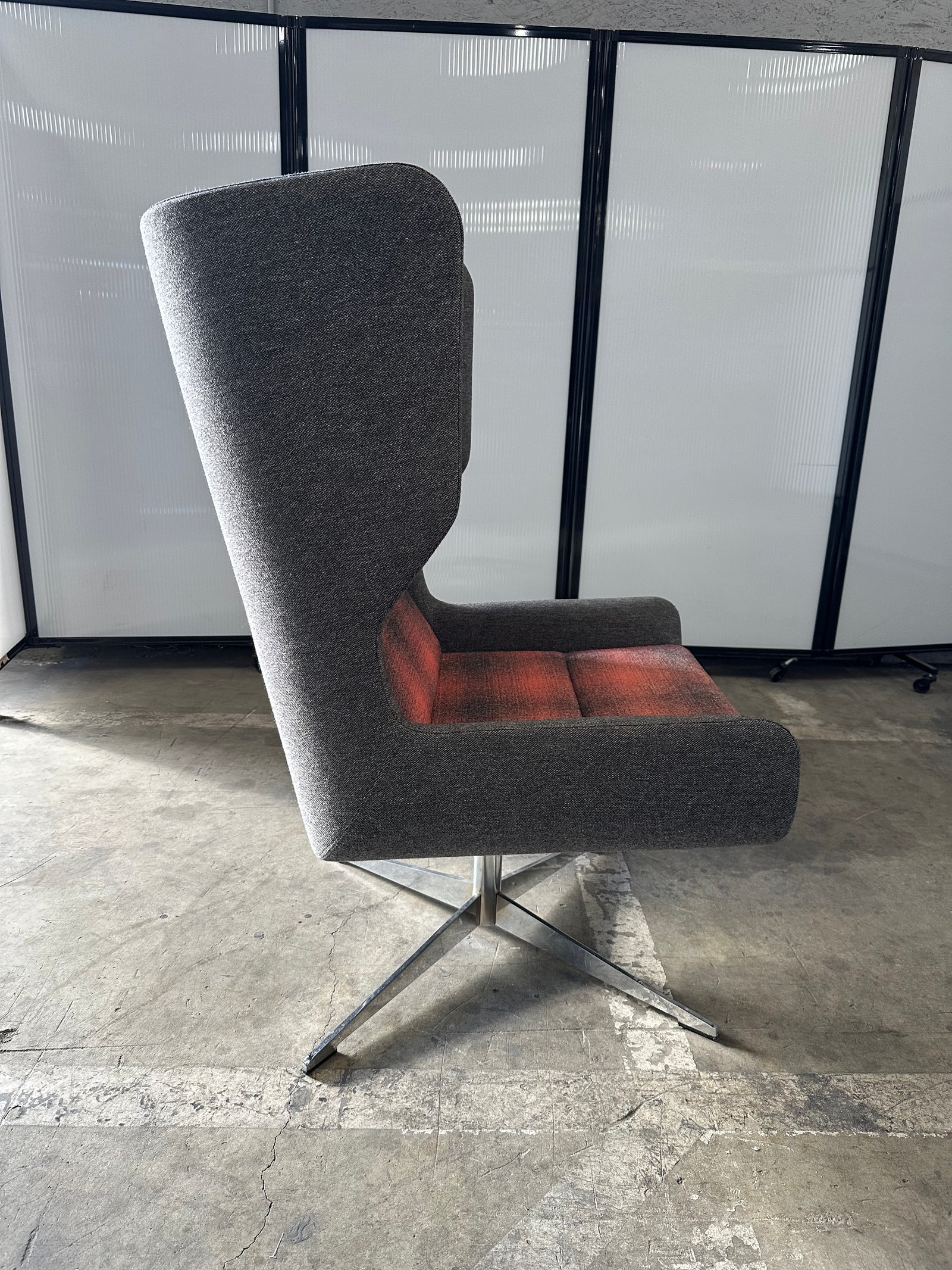 Naughtone light Grey and sunset swivel lounge chair with chrome base