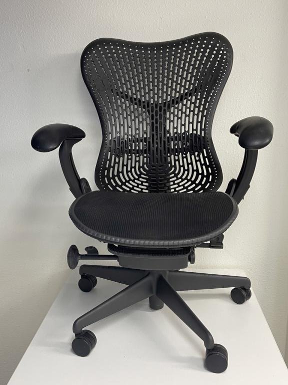 Herman Miller Mirra black seat graphite frame
