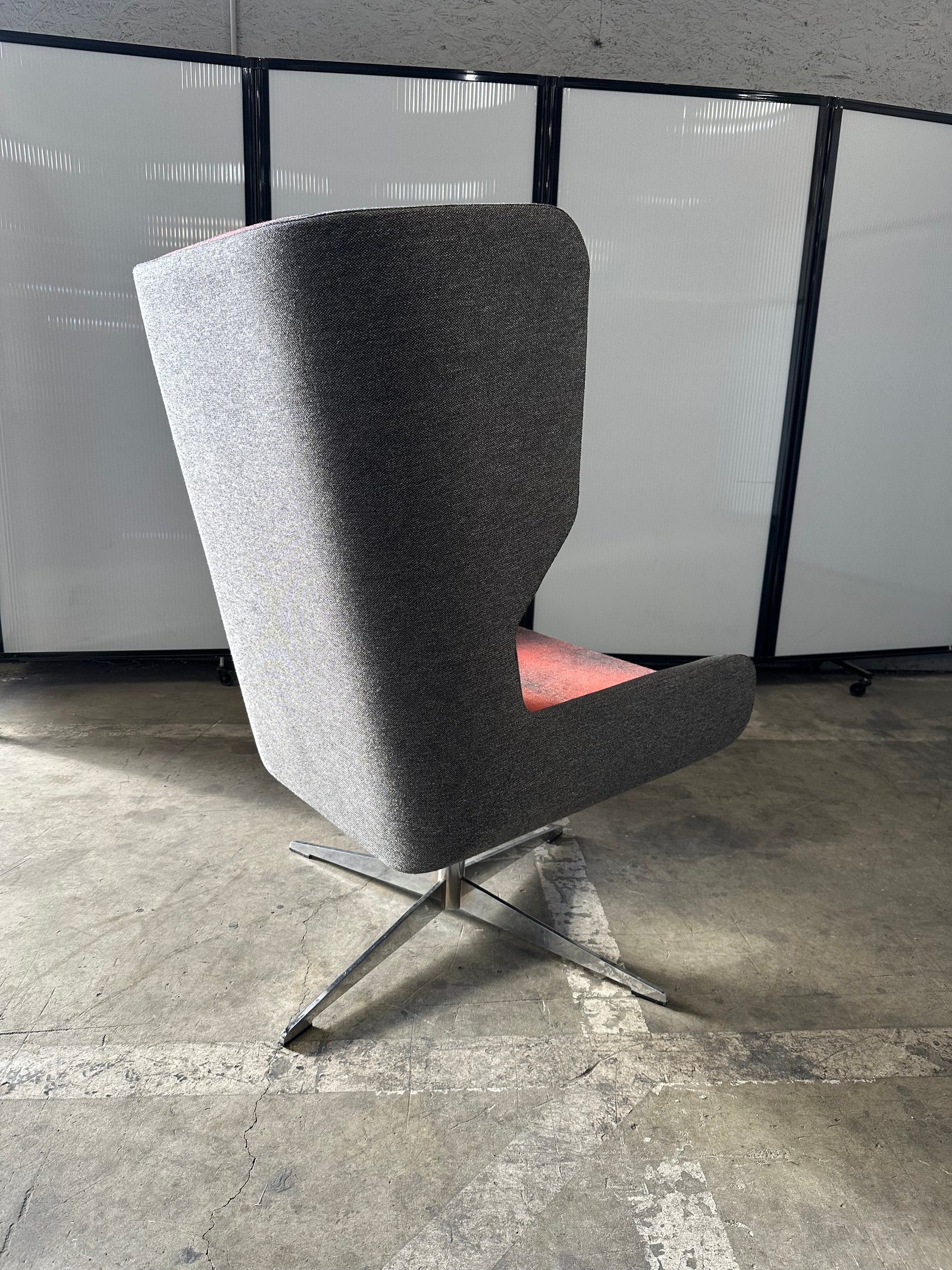 Naughtone light Grey and sunset swivel lounge chair with chrome base