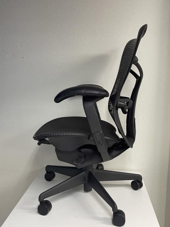 Herman Miller Mirra black seat graphite frame