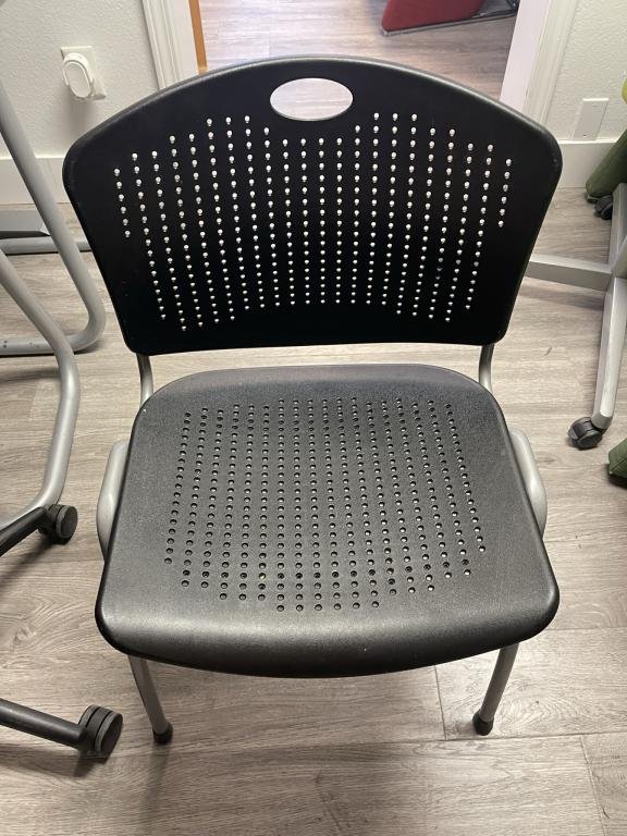 Sit On It black stacking chairs guest or cafe