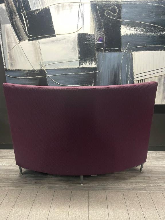Krug purple tall curved couch