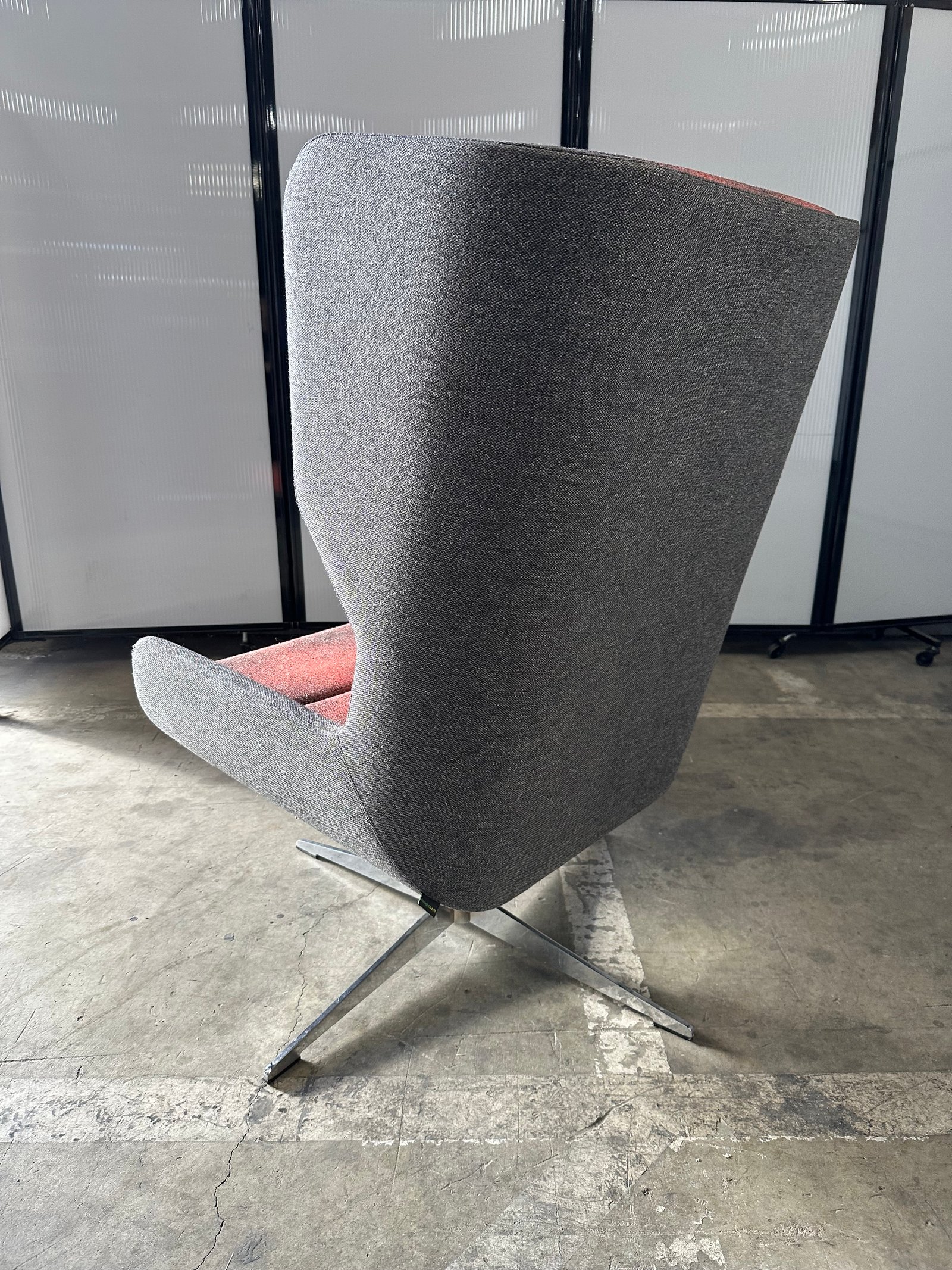 Naughtone light Grey and sunset swivel lounge chair with chrome base