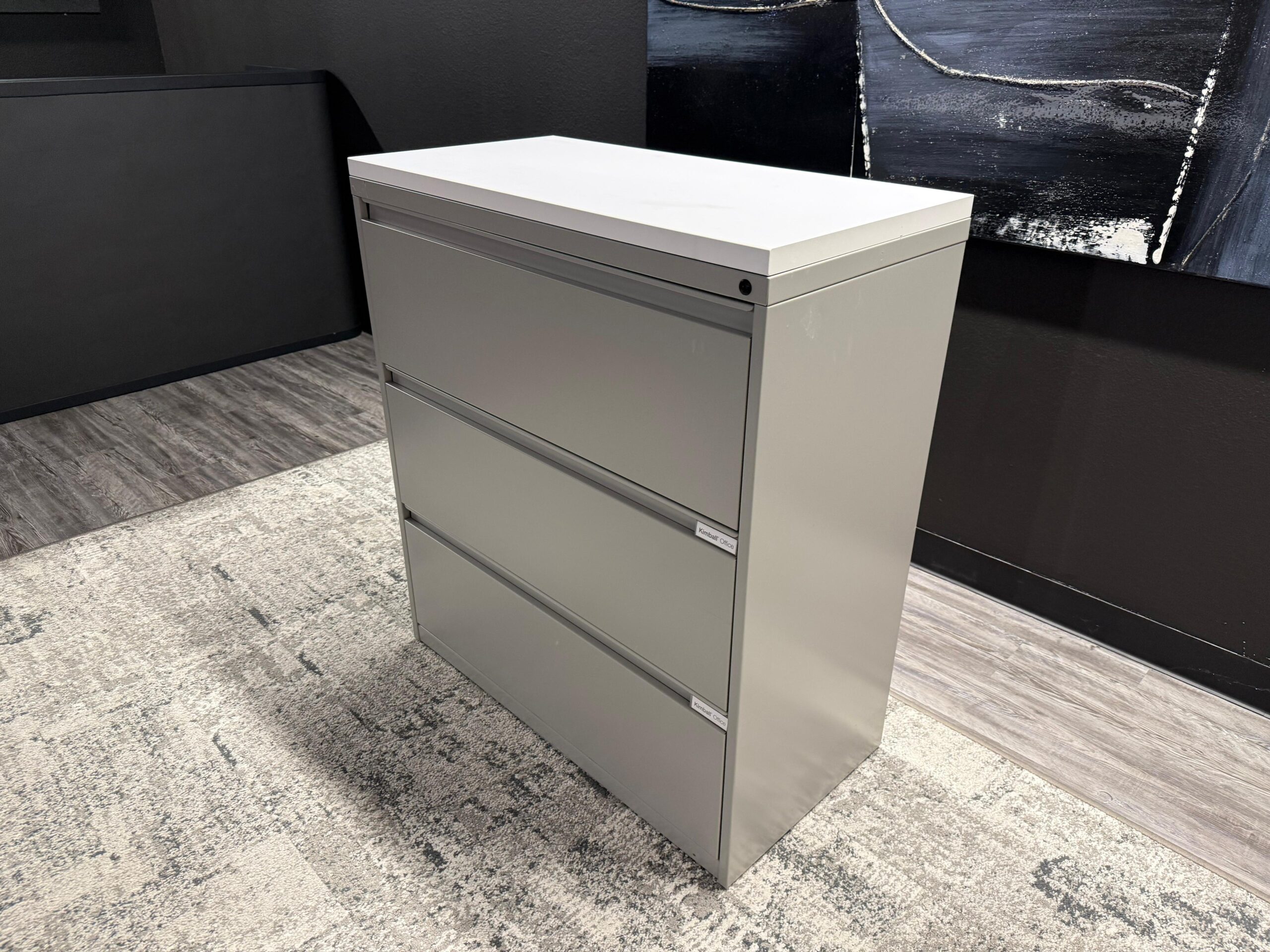 3-drawer lateral file with white top. 3Wx18Dx40T
