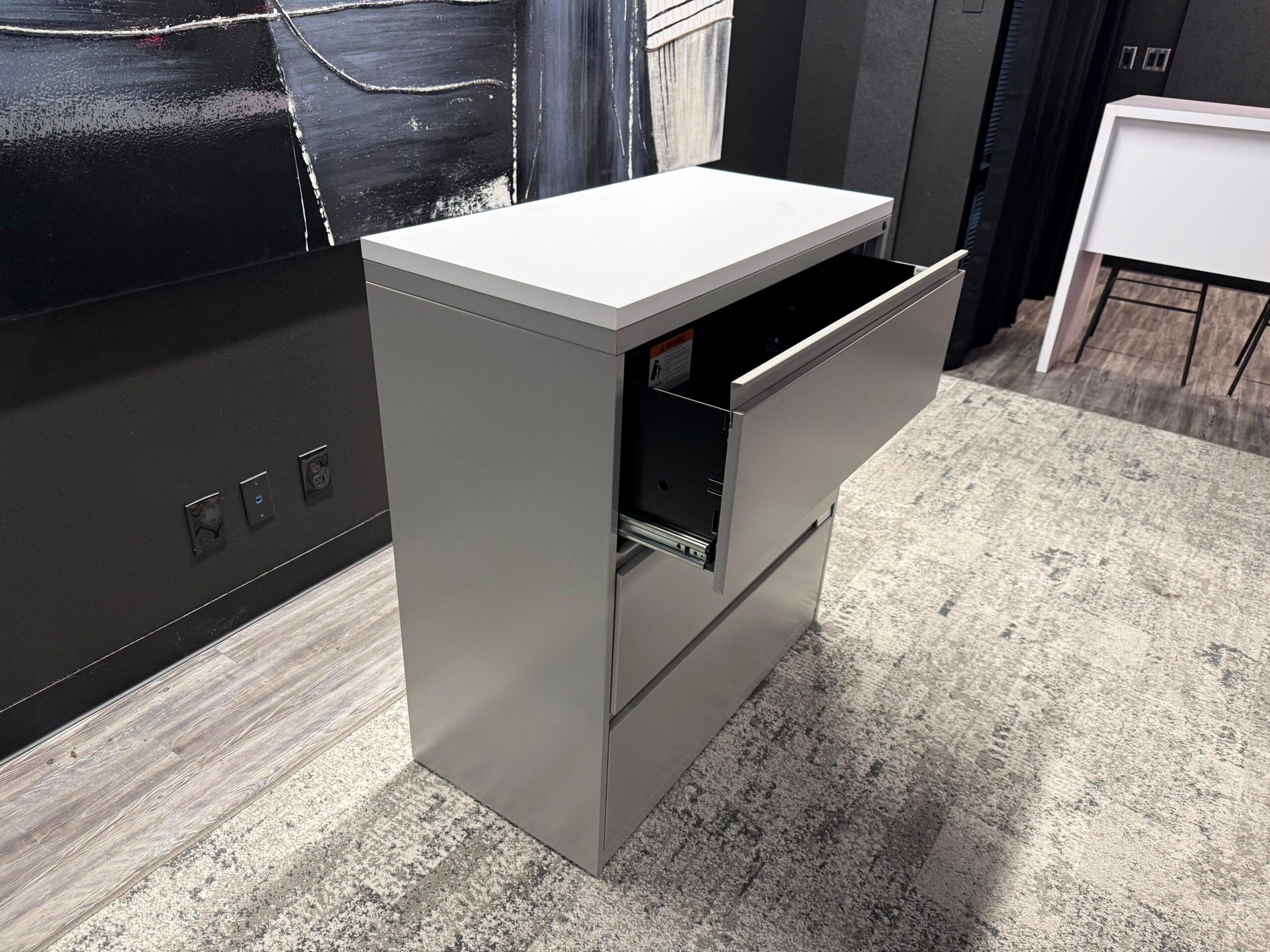 3-drawer lateral file with white top. 3Wx18Dx40T