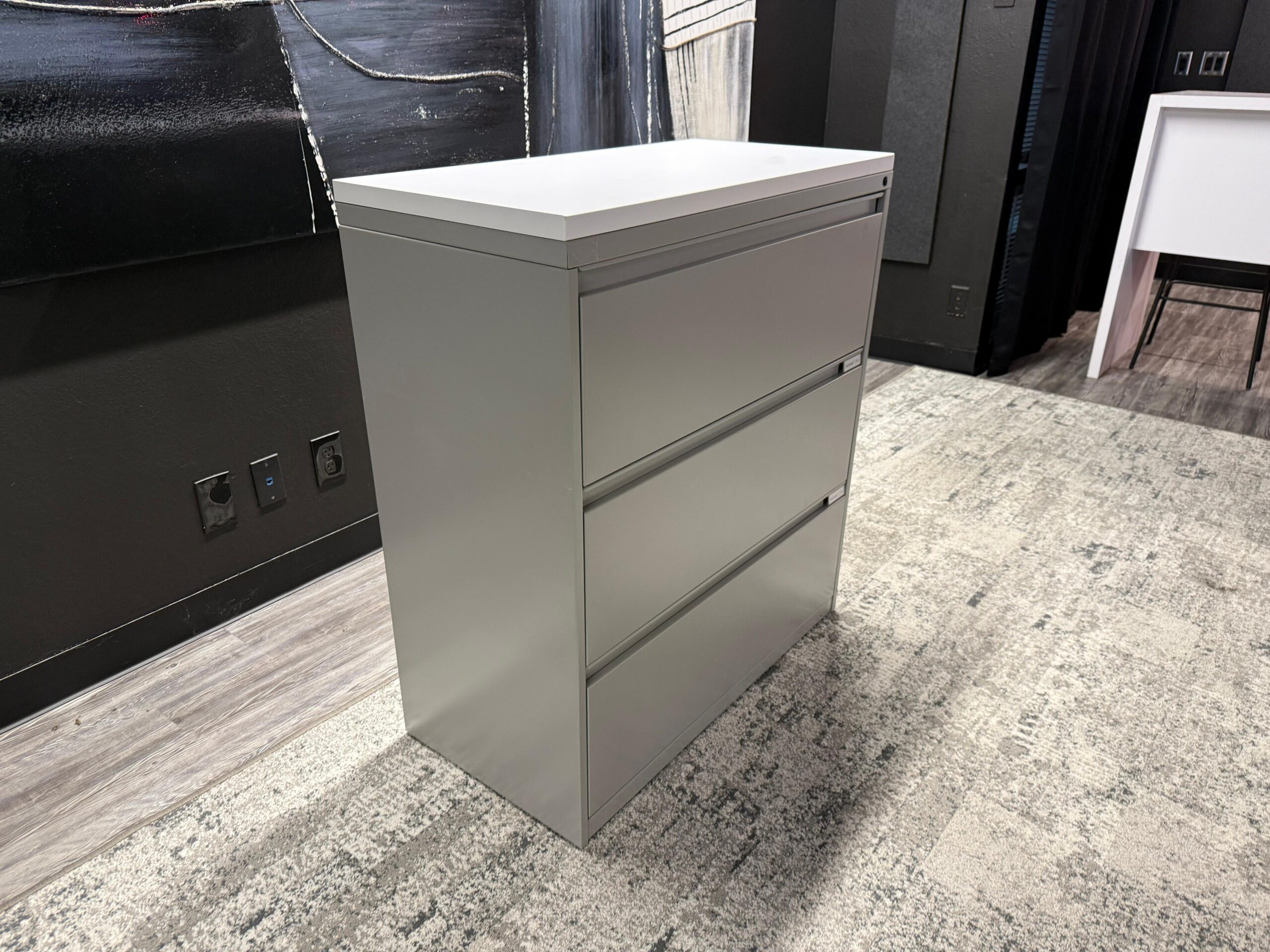 3-drawer lateral file with white top. 3Wx18Dx40T